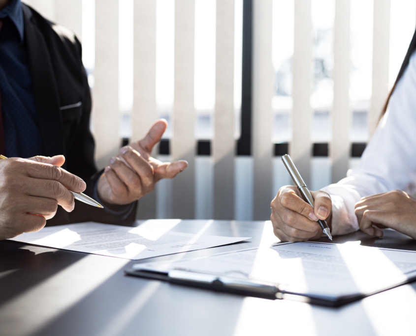 Two business men discussing background investigations